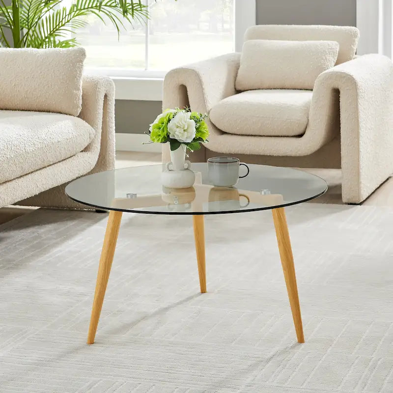 Table basse Danya B. Van Beuren avec pieds fuselés et plateau en verre