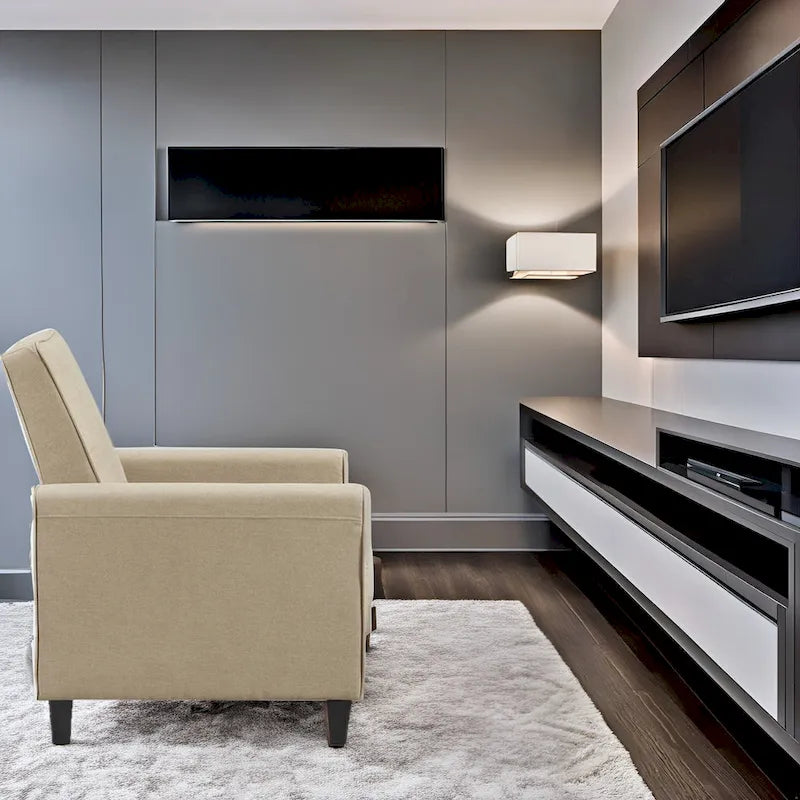 Fauteuil inclinable compact avec accoudoirs et repose-pieds réglable, idéal pour les petits espaces et parfait pour les home cinémas.