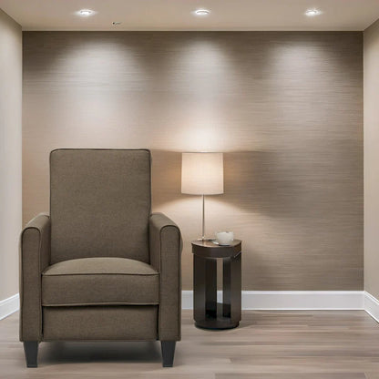 Fauteuil inclinable compact avec accoudoirs et repose-pieds réglable, idéal pour les petits espaces et parfait pour les home cinémas.