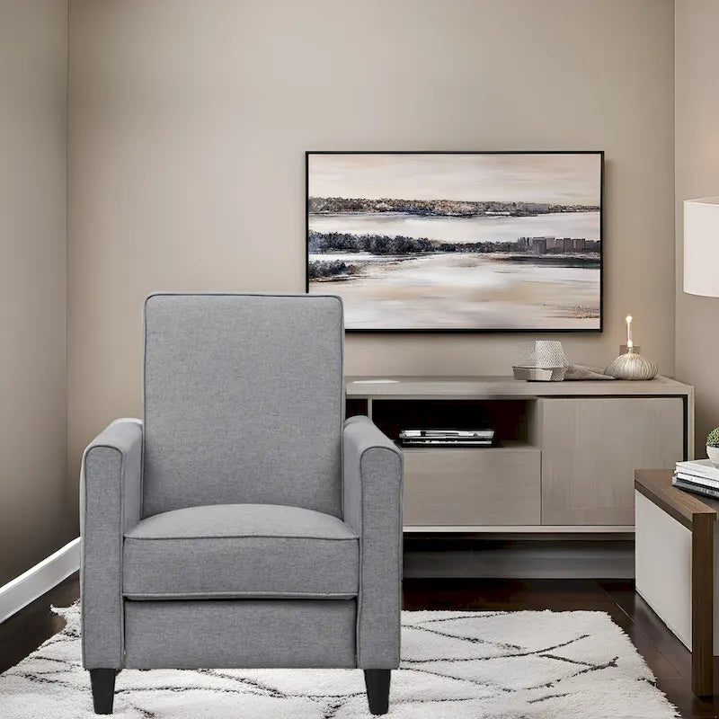 Fauteuil inclinable compact avec accoudoirs et repose-pieds réglable, idéal pour les petits espaces et parfait pour les home cinémas.