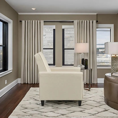 Fauteuil inclinable compact avec accoudoirs et repose-pieds réglable, idéal pour les petits espaces et parfait pour les home cinémas.