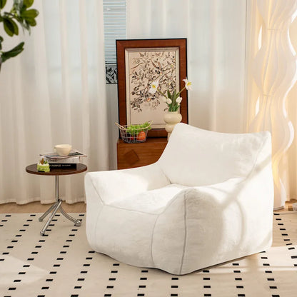 Pouf en fausse fourrure avec dossier, rembourrage en mousse déchiquetée haute densité et design polyvalent