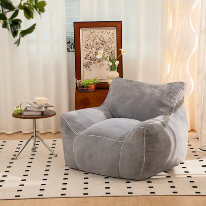 Pouf en fausse fourrure avec dossier, rembourrage en mousse déchiquetée haute densité et design polyvalent