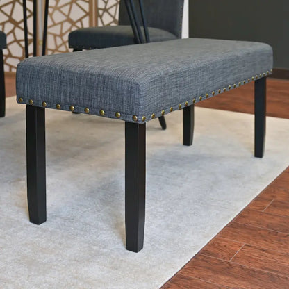 Ensemble de salle à manger de style industriel 6 pièces comprenant une table rectangulaire, 4 chaises et un banc recouverts de lin.