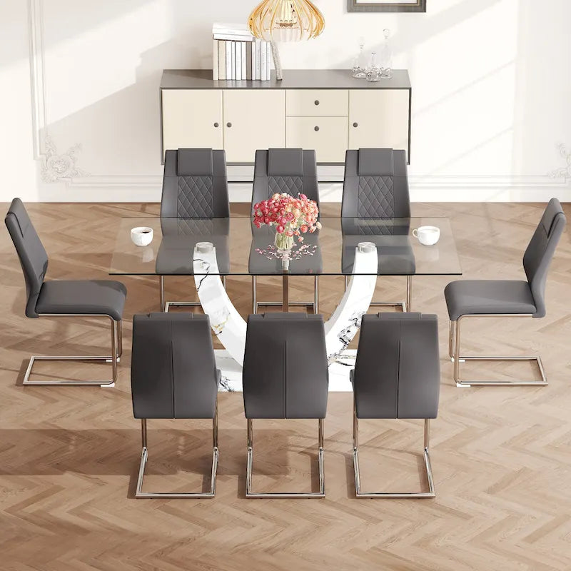 Ensemble table et chaises de salle à manger modernes en verre trempé avec piètement en forme de U à motif marbre et chaises rembourrées en PU