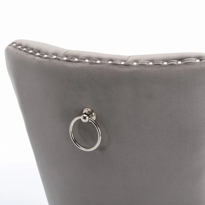 Chaise de salle à manger rembourrée en velours avec pieds en acier inoxydable chromé