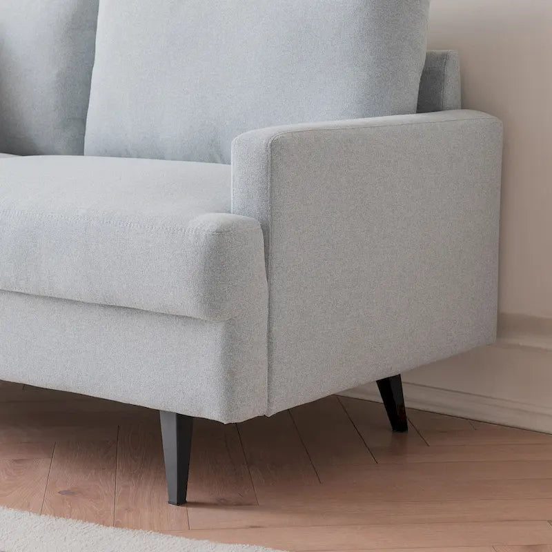 Canapé deux places moderne en tissu, idéal pour le salon, la chambre ou un appartement.