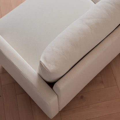 Canapé deux places moderne en tissu, idéal pour le salon, la chambre ou un appartement.