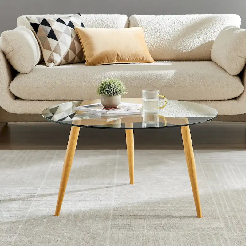 Table basse Danya B. Van Beuren avec pieds fuselés et plateau en verre