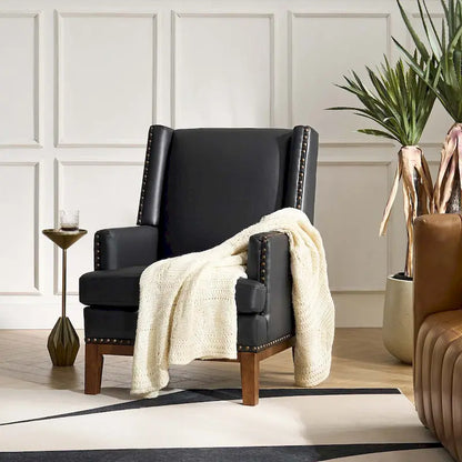 Fauteuil Lourdes en cuir véritable avec structure en bois massif et coussin d'assise amovible par HULALA HOME