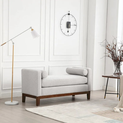 Banquette élégante et capitonnée pour le pied de lit et le salon