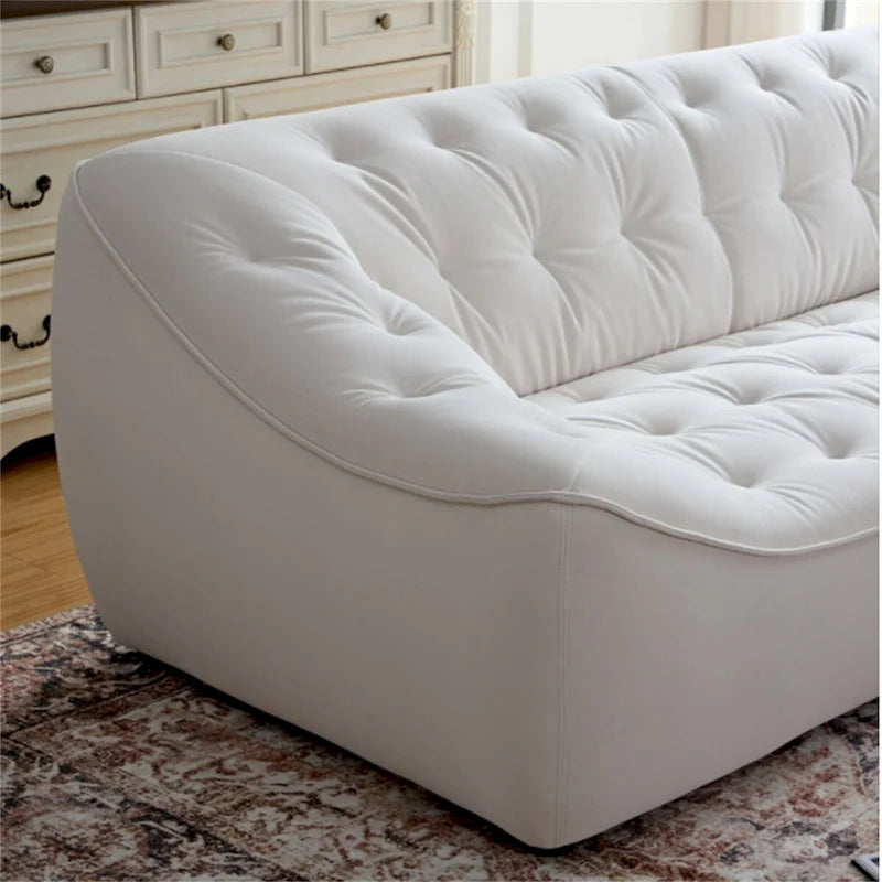 Canapé en tissu blanc résistant avec structure en bois massif