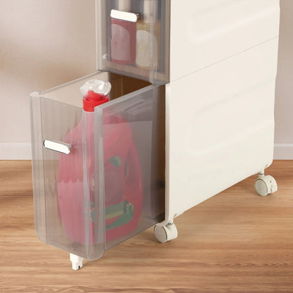 Armoire de rangement pour papier toilette à côté des toilettes, idéale pour les petites salles de bain.